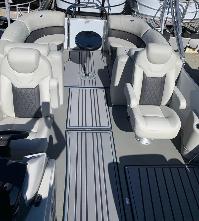 Slide: The Image of 2024 Starcraft SLS3 pontoon boat interior with luxurious seating and modern design. - 8