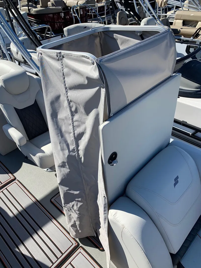 Slide: The Image of 2024 Starcraft SLS3 boat interior with seating and storage compartment. - 12