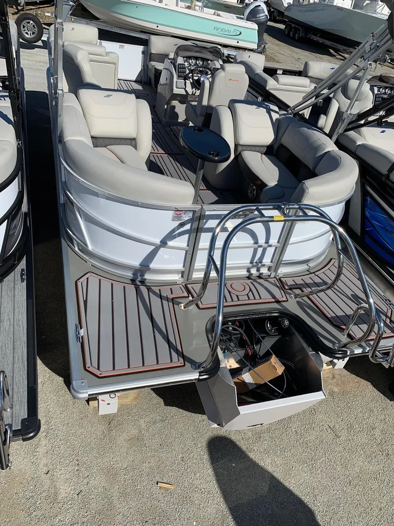 Slide: The Image of 2024 Starcraft SLS3 pontoon boat with luxurious seating and modern design. - 4