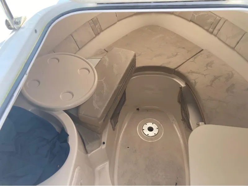 Slide: The Image of Interior cabin of a 2004 Wellcraft 252 Coastal boat with seating and table. - 12