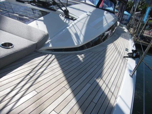 Slide: The Image of 2025 Jeanneau Yacht 65 deck with sleek design and modern fittings. - 29