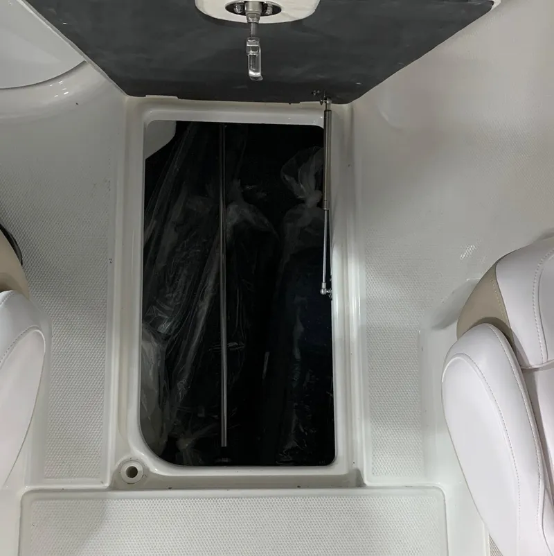 Slide: The Image of 2024 Robalo R207 Dual Console interior storage compartment. - 12