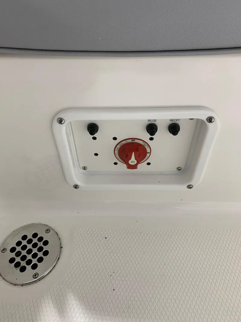 Slide: The Image of Control panel on a 2024 Robalo 206 Cayman boat. - 6