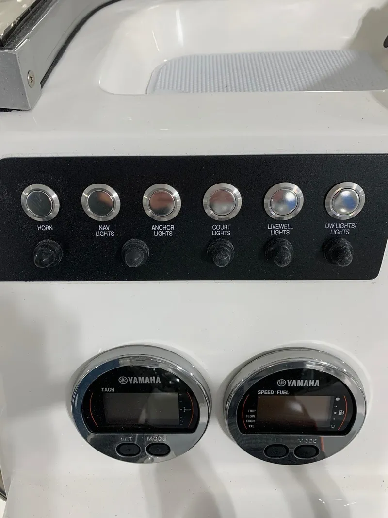 Slide: The Image of Control panel of 2024 Robalo 206 Cayman boat with Yamaha gauges. - 14