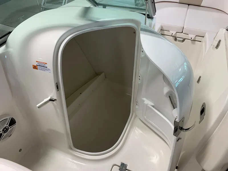 Slide: The Image of 2024 Robalo R207 Dual Console boat interior storage compartment. - 14