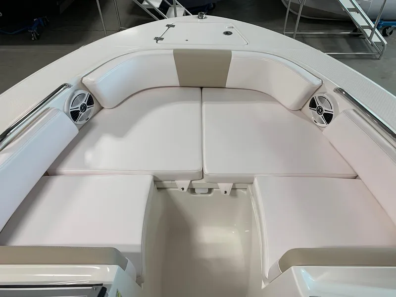 Slide: The Image of 2024 Robalo R207 Dual Console boat with spacious bow seating area. - 6