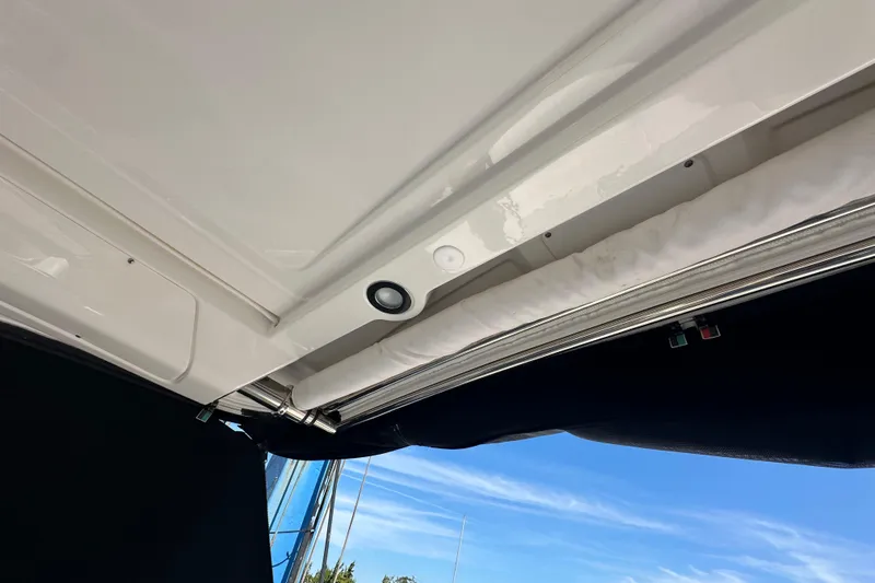 Slide: The Image of 2019 Chaparral 347 SSX boat interior detail with speaker and canopy. - 35