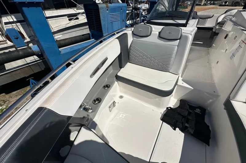 Slide: The Image of 2019 Chaparral 347 SSX boat interior with seating and cup holders. - 46