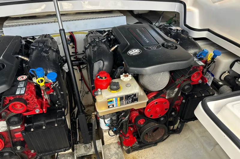 Slide: The Image of Engine compartment of 2019 Chaparral 347 SSX boat, featuring dual inboard motors. - 51