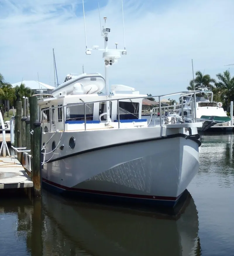 The Image of Great Harbour N40 2025 yacht docked at marina under clear sky. - 0