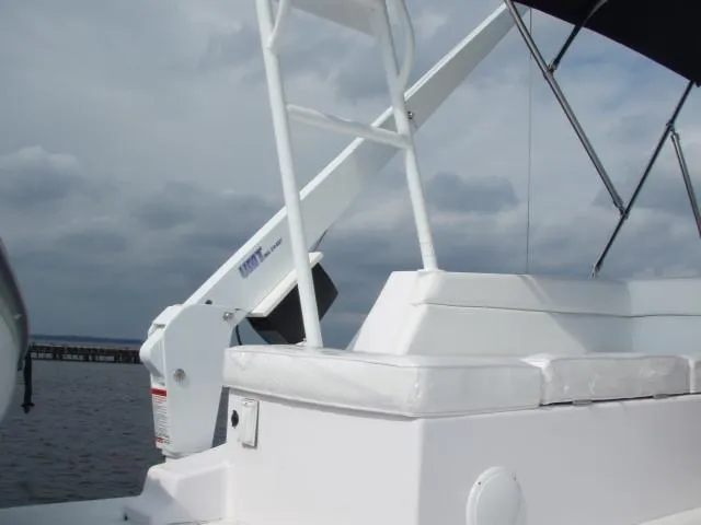 Slide: The Image of Great Harbour N40 boat deck with seating, 2025 model, under cloudy sky. - 15
