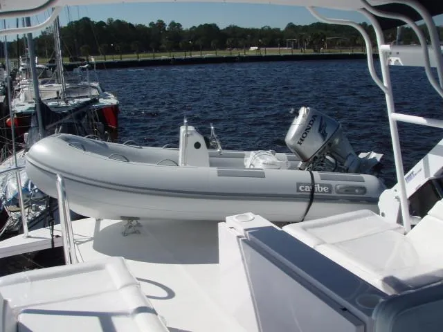 Slide: The Image of 2025 Great Harbour N40 yacht with inflatable dinghy and Honda outboard motor. - 20