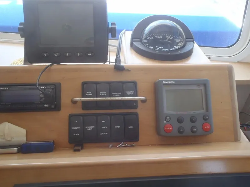 Slide: The Image of Great Harbour N40 2025 boat dashboard with navigation instruments and control panel. - 39