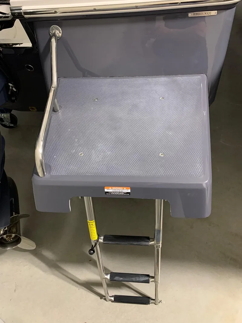 Slide: The Image of 2024 Robalo 226 Cayman swim platform with ladder. - 16