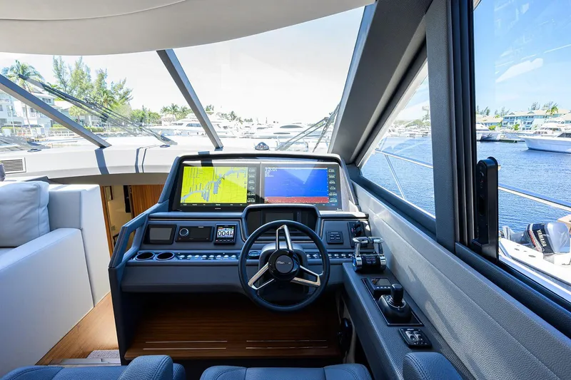 Slide: The Image of Interior view of Maritimo X60 cockpit, 2020 model, featuring modern navigation. - 26