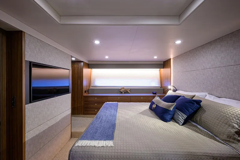 Slide: The Image of Luxurious bedroom on the 2020 Maritimo X60 yacht. - 35