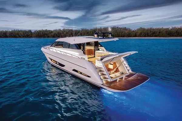 Slide: The Image of Luxury yacht Maritimo X60 2020 on open water at sunset. - 4