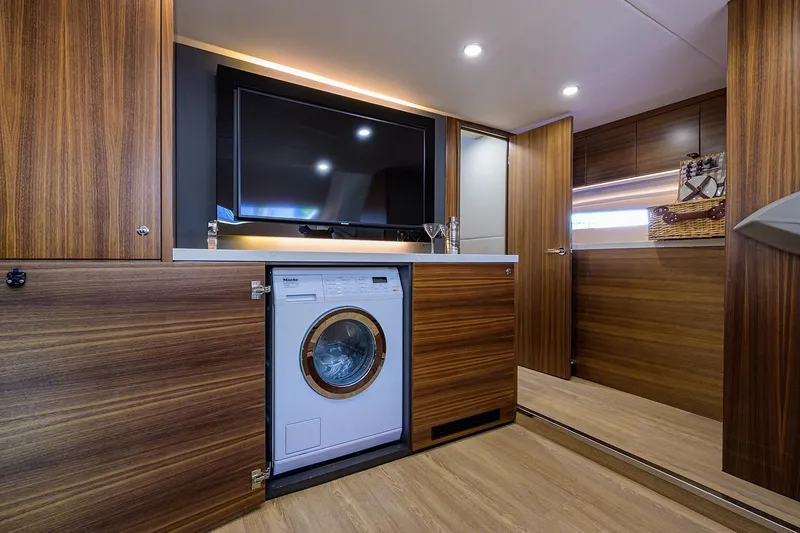 Slide: The Image of Interior of Maritimo X60 yacht with washing machine and TV, 2020 model. - 47
