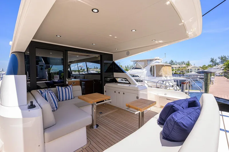 Slide: The Image of Luxurious Maritimo X60 yacht deck with seating area, 2020 model. - 6