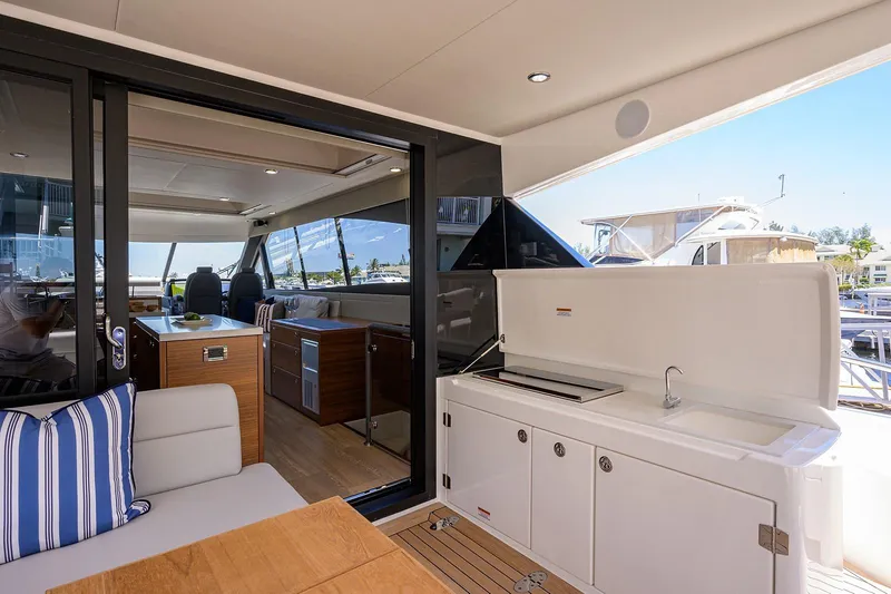 Slide: The Image of Maritimo X60 2020 yacht with modern interior and outdoor area. - 8