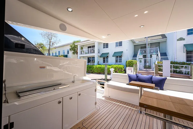 Slide: The Image of Luxurious outdoor area of the 2020 Maritimo X60 yacht. - 9