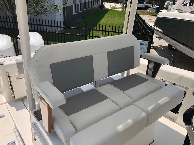 Slide: The Image of 2025 Pursuit S 288 boat with cushioned seating. - 8