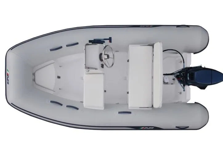 Slide: The Image of 2024 AB Inflatables 10 VSX inflatable boat, top view, white with steering console and outboard motor. - 3