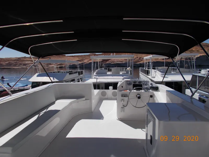 Slide: The Image of 2020 Sumerset Antelope Escape Share #4 houseboat with spacious deck and helm. - 11