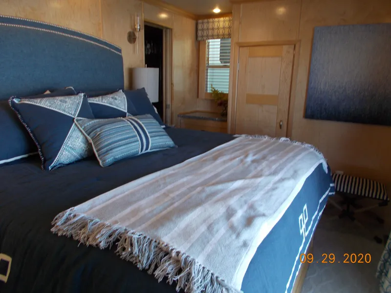 Slide: The Image of Cozy bedroom in 2020 Sumerset Antelope Escape Share #4 with blue and white decor. - 22