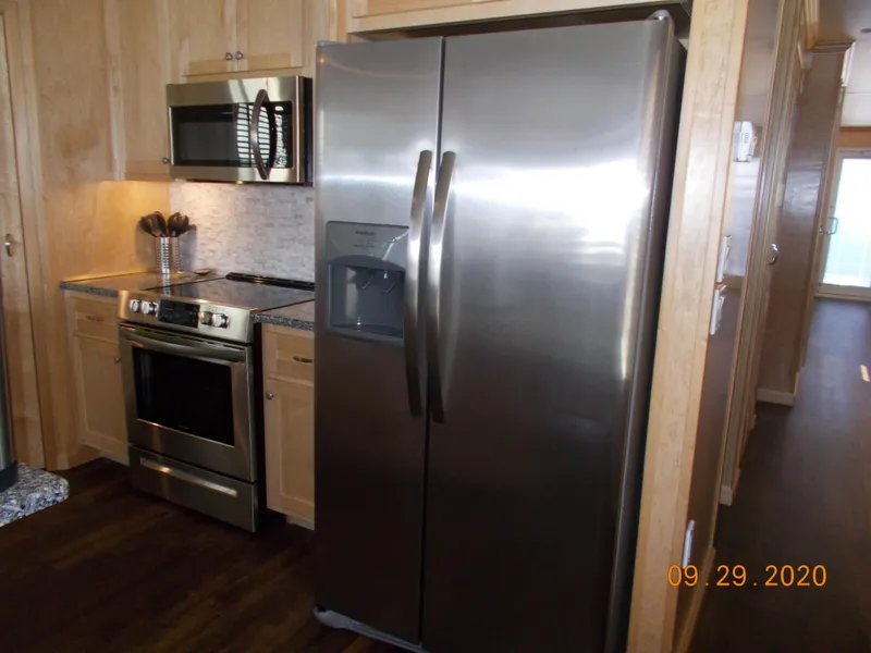 Slide: The Image of Modern kitchen with stainless steel appliances in a 2020 Sumerset Antelope Escape Share #4. - 28