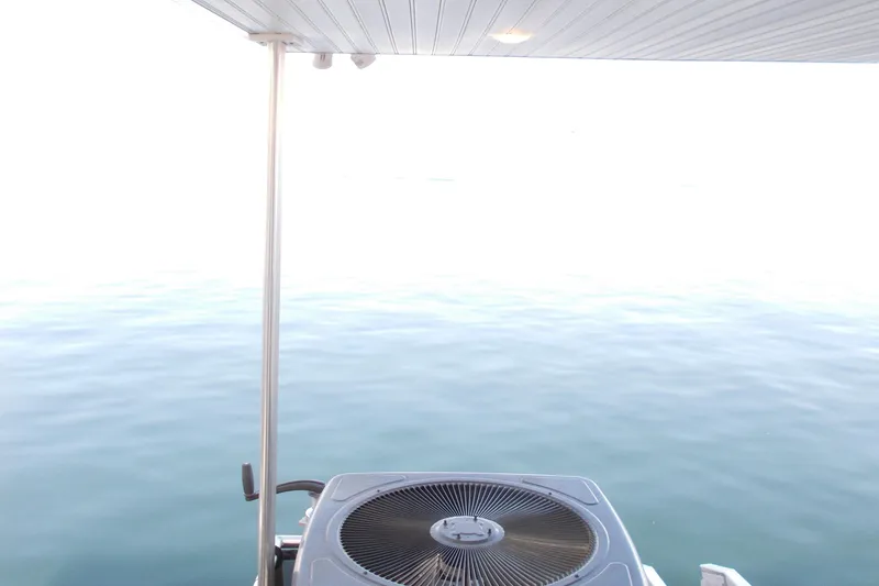 Slide: The Image of Sumerset Antelope Escape Share #4 houseboat, 2020 model, overlooking serene water. - 38