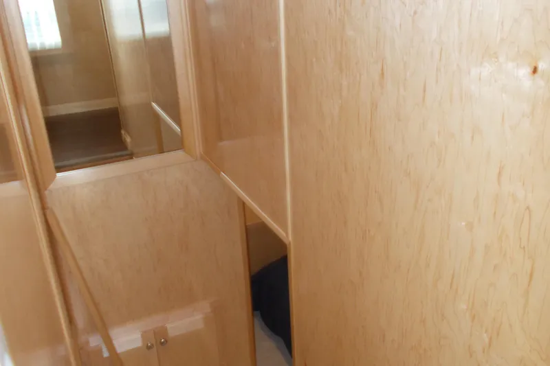 Slide: The Image of Interior of 2020 Sumerset Antelope Escape Share #4 with wooden cabinetry. - 44