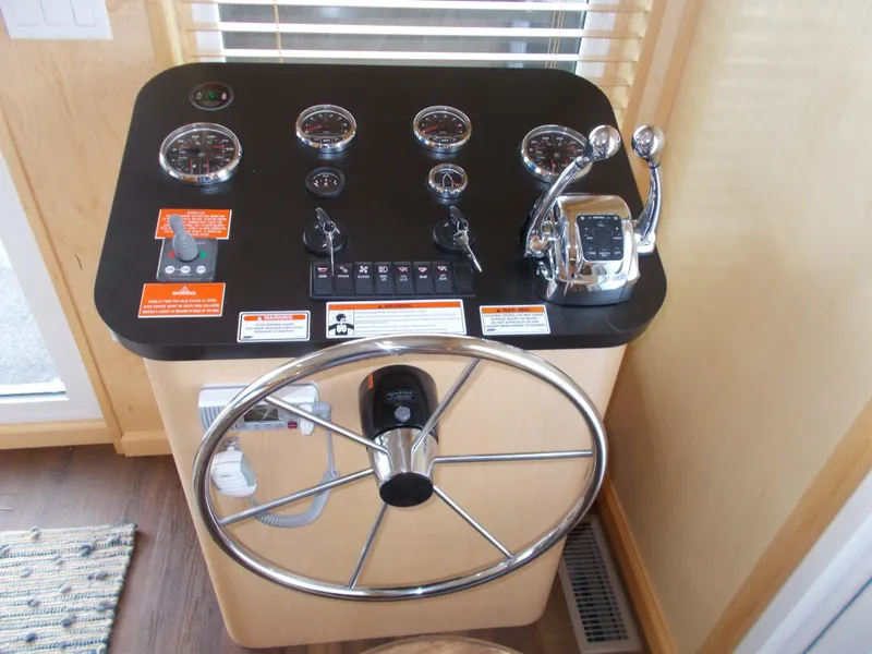 Slide: The Image of Control panel of a 2020 Sumerset Antelope Escape Share #4 houseboat. - 6