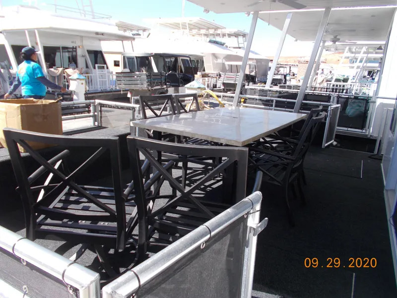 Slide: The Image of Outdoor dining area on 2020 Sumerset Antelope Escape Share #4 houseboat. - 8