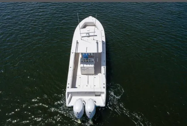 Slide: The Image of 2019 Jupiter 38 HFS boat with dual engines on open water. - 2