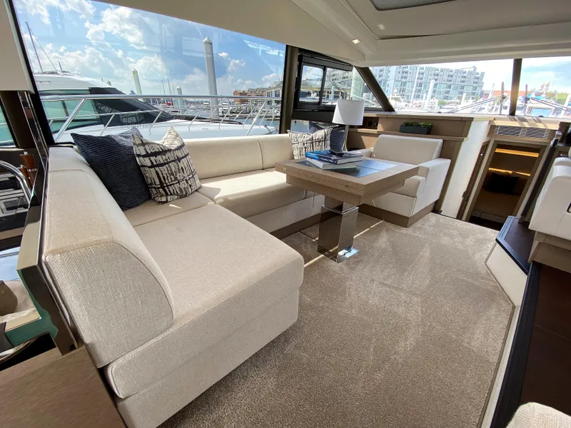 Slide: The Image of Luxurious interior of the 2025 Prestige 520 S yacht with modern furnishings. - 12