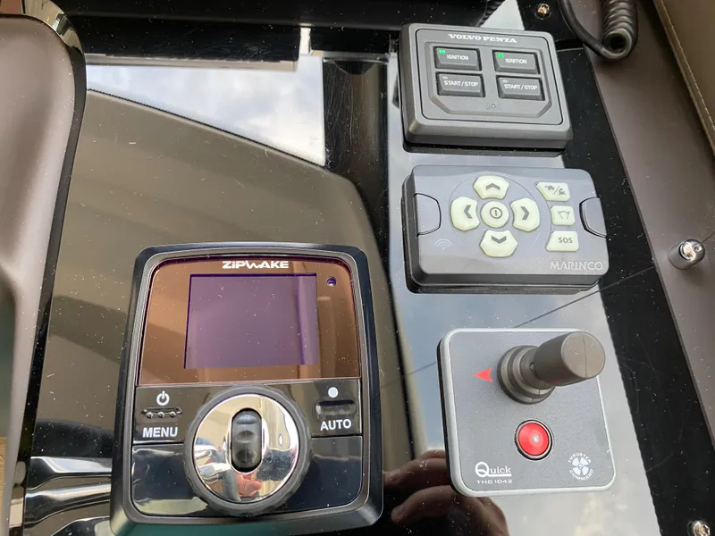 Slide: The Image of Control panel of a 2025 Prestige 520 S yacht with Zipwake and Quick systems. - 17