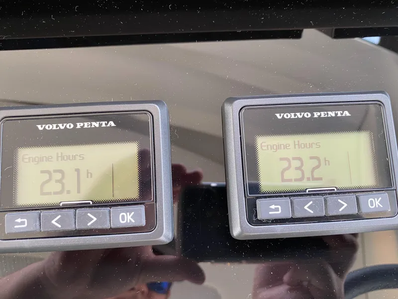 Slide: The Image of Volvo Penta engine hour meters on Prestige 520 S, 2025 model, showing 23.1 and 23.2 hours - 20