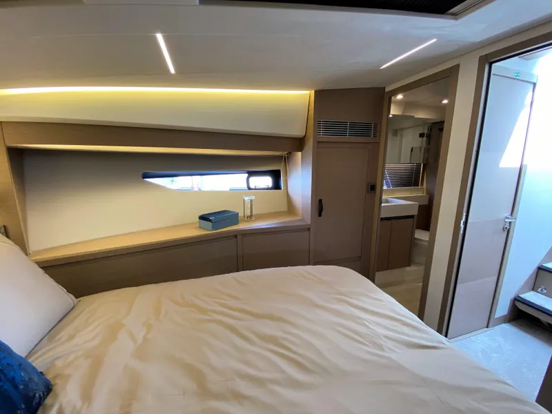 Slide: The Image of Luxurious bedroom interior of 2025 Prestige 520 S yacht with modern design. - 24