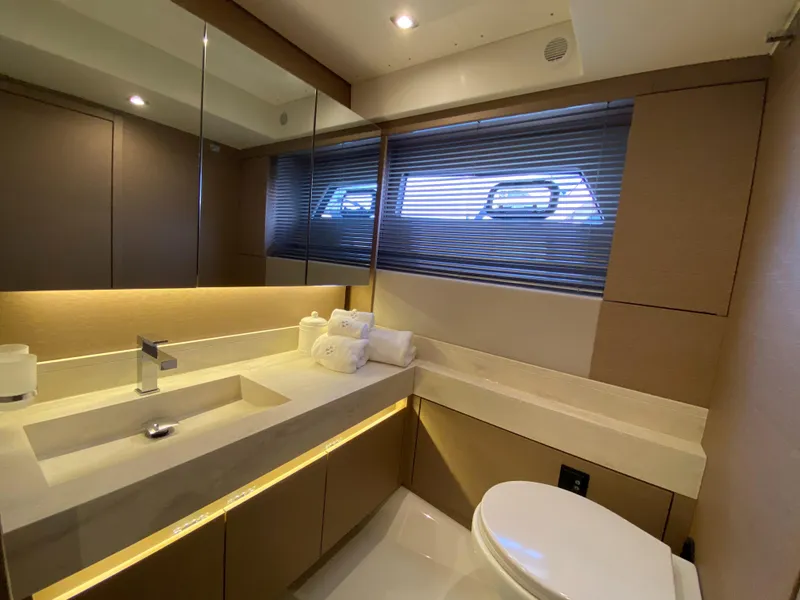 Slide: The Image of Modern bathroom in 2025 Prestige 520 S yacht with sleek design and ample lighting. - 35