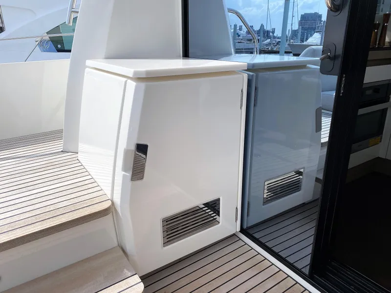 Slide: The Image of Prestige 520 S 2025 yacht interior, featuring sleek cabinetry and modern design. - 5