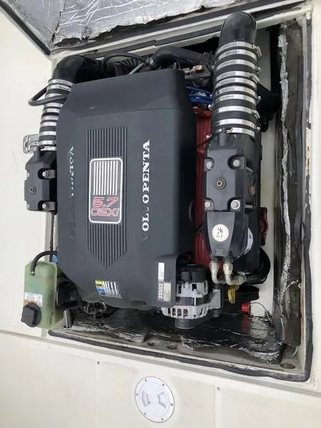 Slide: The Image of Volvo Penta 5.7 GXI engine in a 2004 Medeiros Limestone 24 Cuddy Cabin boat. - 15