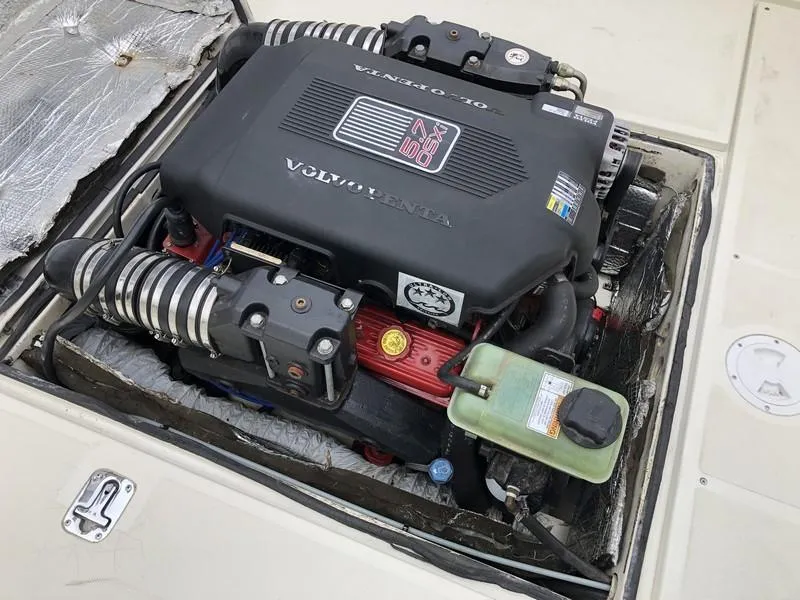 Slide: The Image of Volvo Penta engine in 2004 Medeiros Limestone 24 Cuddy Cabin boat, detailed view. - 16