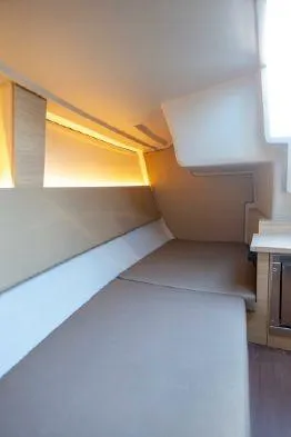 Slide: The Image of Interior cabin of 2026 Saffier Se 27 Leisure yacht, featuring cozy beige seating. - 9