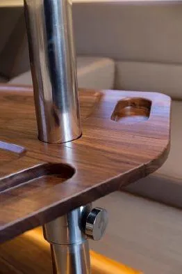 Slide: The Image of Close-up of Saffier Se 37 Lounge 2026 interior, featuring a wooden table with metal support. - 11