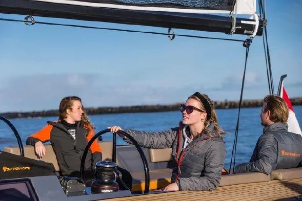 Slide: The Image of People sailing on a 2026 Saffier Se 37 Lounge yacht, enjoying a sunny day. - 4
