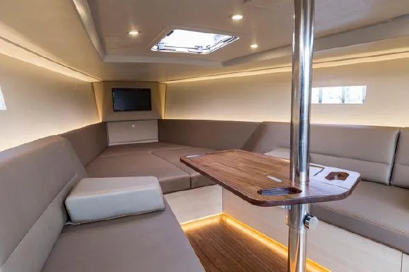 Slide: The Image of Luxurious interior of 2026 Saffier Se 37 Lounge yacht with modern seating and table. - 7