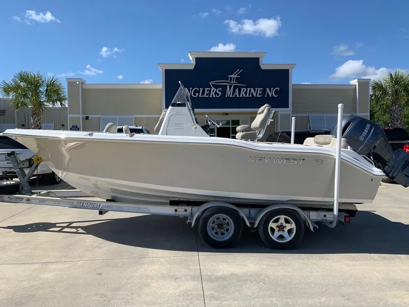 The Image of 2024 Key West 219 FS boat on trailer at Anglers Marine NC dealership. - 0