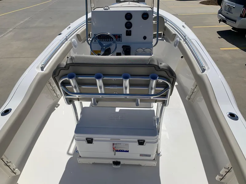 Slide: The Image of 2024 Key West 219 FS boat interior with console and seating. - 10