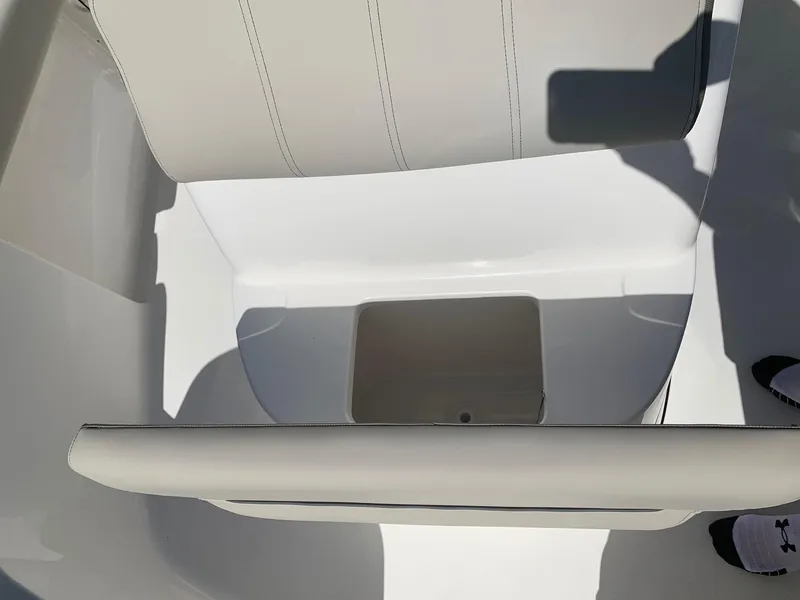 Slide: The Image of 2024 Key West 219 FS boat seating and storage compartment. - 18
